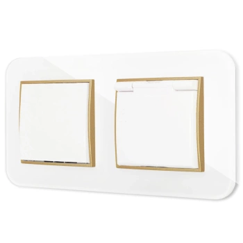 Włącznik pojedynczy z gniazdem hermetycznym z ramką zaokrągloną efekt szkła seria ICON kolor biały/złoty