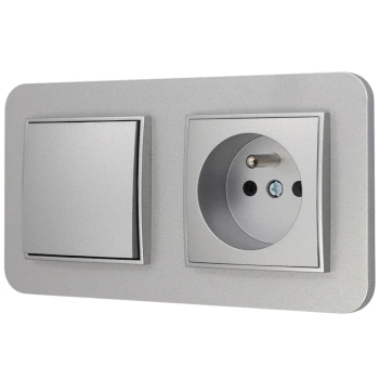 Włącznik pojedynczy z gniazdem pojedynczym z ramką zaokrągloną seria MINI kolor srebrny