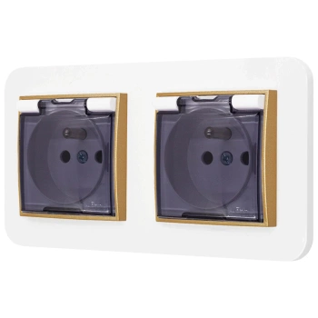 Dwa gniazda hermetyczne do łazienki z ramką zaokrągloną seria MINI kolor biały mat/złoty