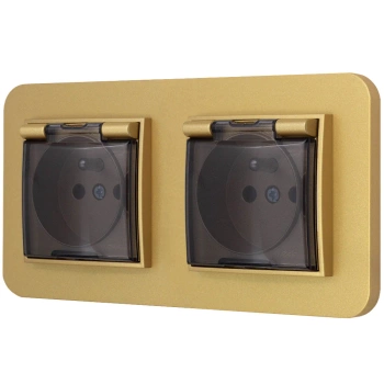 Dwa gniazda hermetyczne do łazienki z ramką zaokrągloną seria MINI kolor złoty