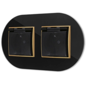 Dwa gniazda hermetyczne do łazienki z ramką okrągłą efekt szkła seria ICON kolor czarny/złoty