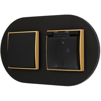 Włącznik pojedynczy z gniazdem hermetycznym z ramką okrągłą seria MINI kolor czarny złoty