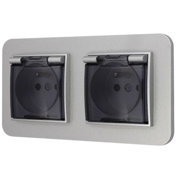 Dwa gniazda hermetyczne do łazienki z ramką zaokrągloną seria MINI kolor srebrny